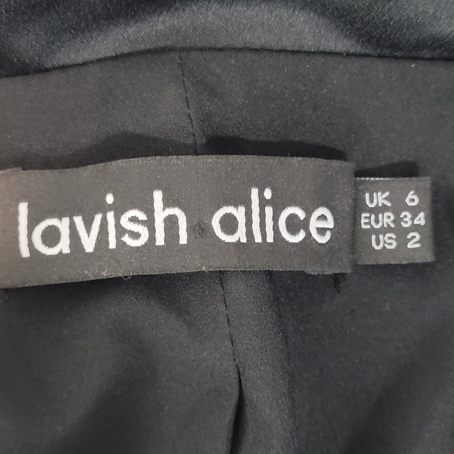 Lavish Alice Black Silky Long Sleeve Tuxedo Style Pockets Lined Romper Size 2