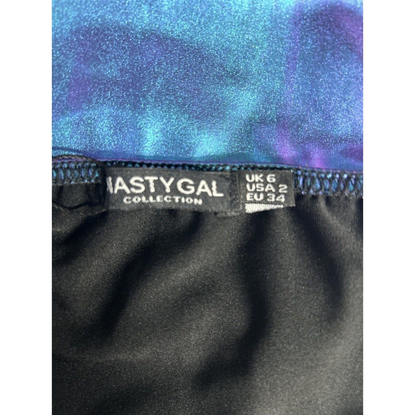 NWT Nasty Gal iridescent Purple Blue Spaghetti Strap One Piece Bodysuit Size 2