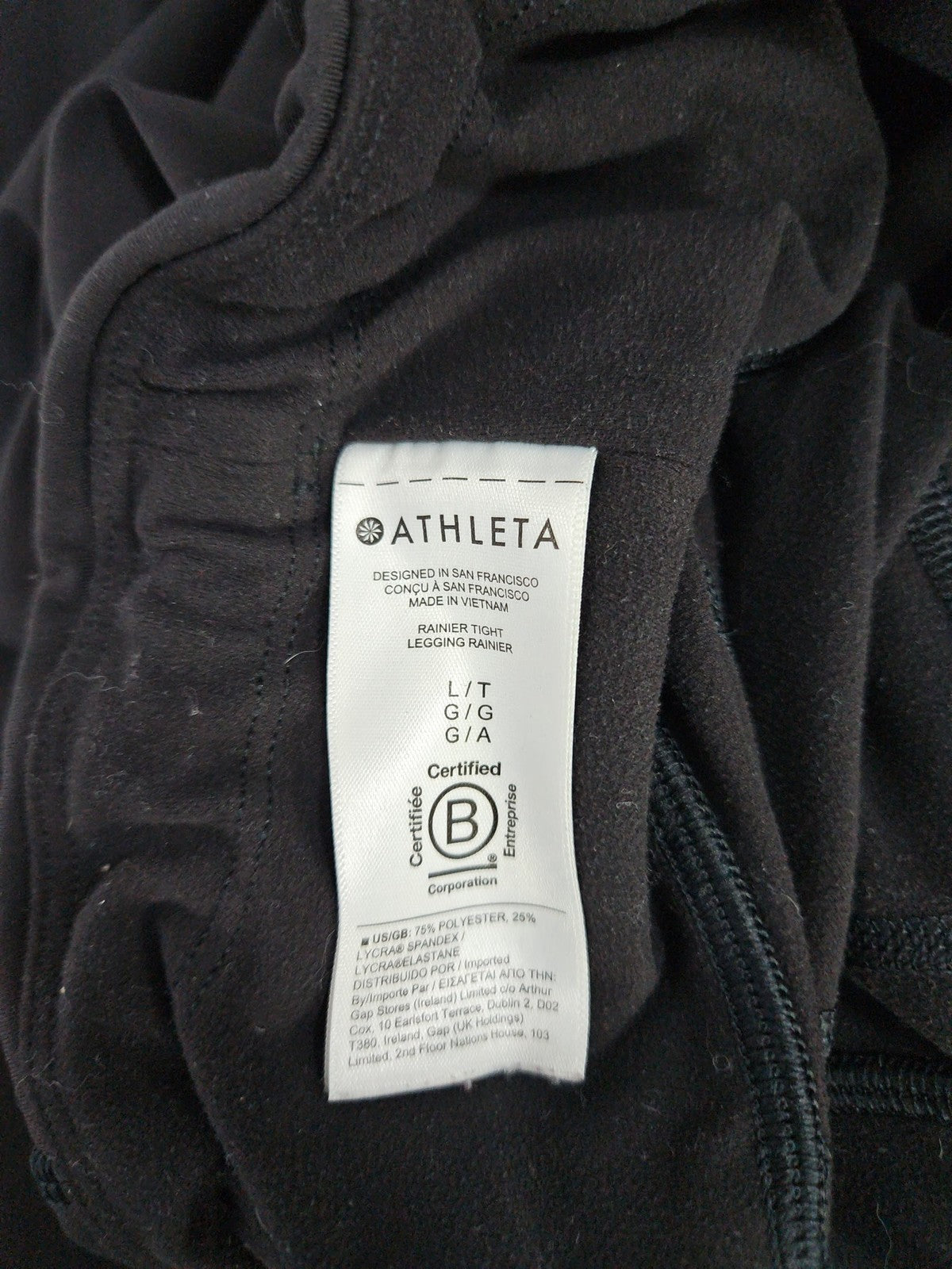 Athleta Rainier Tight Black Zip Pocket Running Leggings Women's L