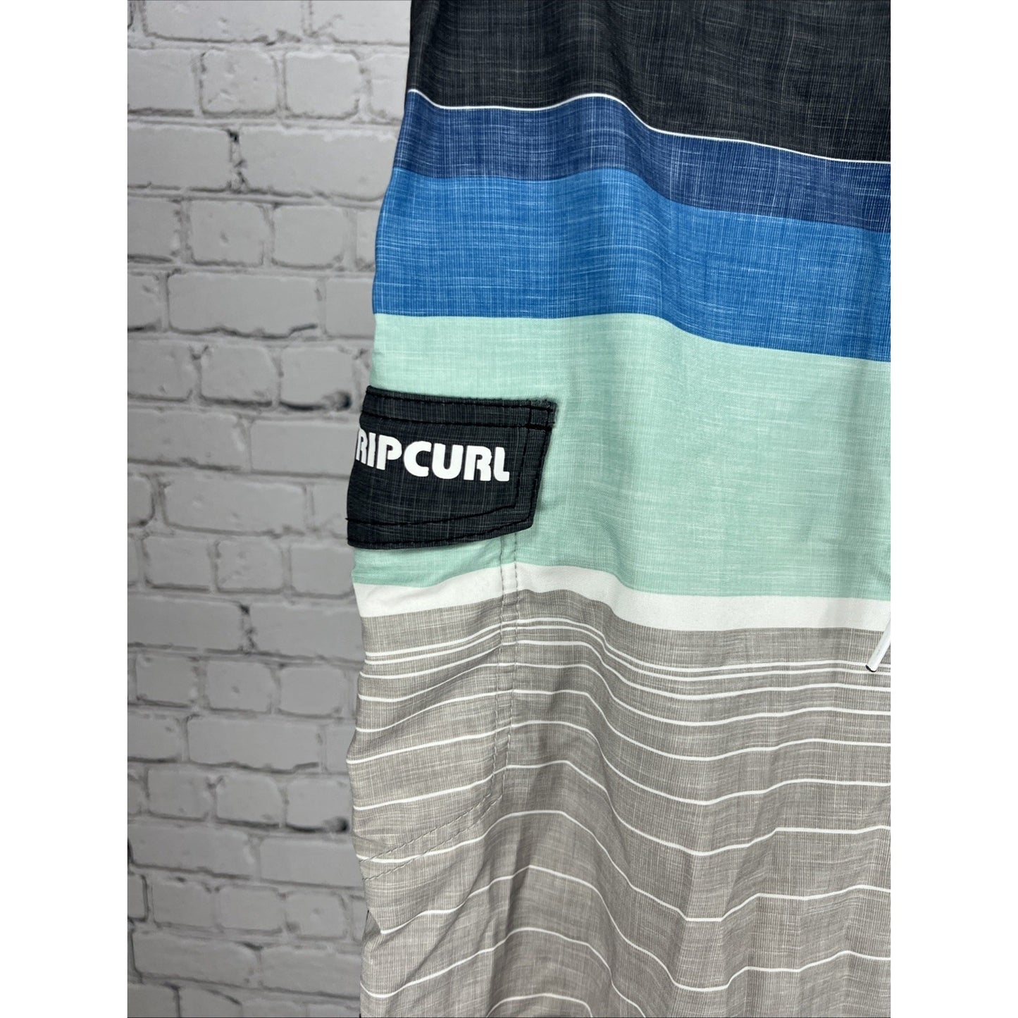 Rip Curl Blue Gray Board Swim Shorts Pocket Strap Logo Unlined Men’s 34